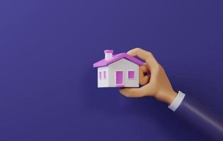 mão de empresário segurando uma pequena casa com telhado rosa em um fundo roxo. foto