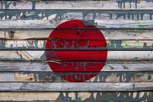 a bandeira nacional do japão é pintada em placas irregulares. símbolo do país. foto