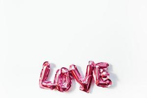 conceito de amor. balão inflável rosa com letras foto