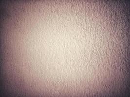 textura de parede de cimento velho marrom. textura da parede de concreto para segundo plano. fundo vintage marrom velho. foto