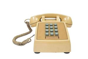 vista frontal do telefone dos anos 80 mais velhos isolado branco. telefone de casa velha foto