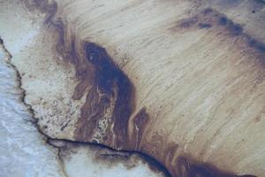 o derramamento de óleo do Golfo é mostrado em uma praia foto