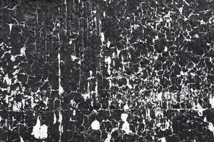textura de parede descascada preto e branco, superfície texturizada resistida, fundo grunge. foto