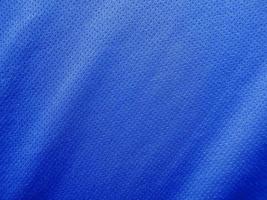 textura de jersey de tecido de roupas esportivas azuis foto