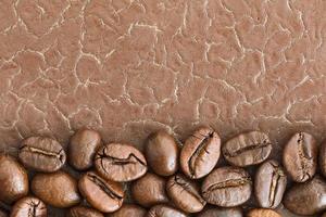 vista superior grãos de café torrados com espaço de cópia foto