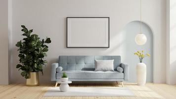 moldura de cartaz simulada com sofá azul e decoração na sala de estar.