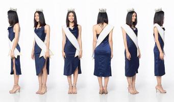 corpo inteiro do concurso de concurso de beleza miss usar vestido de lantejoulas azul com coroa de diamantes foto