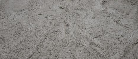 textura mistura de concreto é a introdução de cimento, pedra, areia e água, bem como produtos químicos adicionados e outros materiais misturados. foto