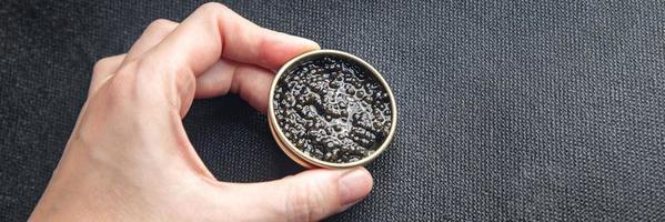 caviar peixe preto esturjão beluga, esturjão estrelado refeição fresca lanche na mesa cópia espaço fundo de comida foto