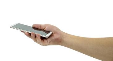 mão segurando o telefone inteligente móvel isolado no fundo branco, traçado de recorte foto