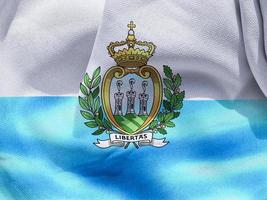 ilustração 3D de uma bandeira de san marino - bandeira de tecido acenando realista foto