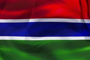 bandeira da gâmbia - bandeira de tecido acenando realista foto