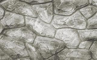 abstrato da parede de pedra calcária com manchas de grunge e ferrugem, arranhões sujos. foto