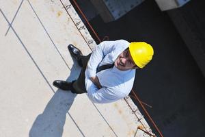 arquiteto no canteiro de obras foto