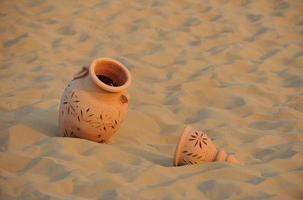 pote árabe na areia foto
