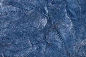plano de fundo texturizado de couro azul amassado foto