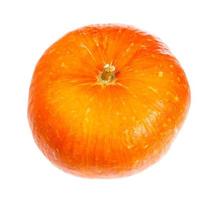 cabeça de abóbora laranja madura isolada em branco foto