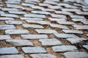 pedras de pavimentação na rua da cidade foto