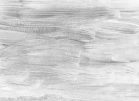 pintura abstrata de fundo branco. pano de fundo monocromático leve. arte minimalista em preto e branco. pinceladas no papel. foto