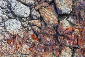 superfície detalhada de metal enferrujado e asfalto com muita corrosão em alta resolução foto