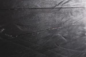 textura de fundo de madeira colorida vintage com nós e furos de prego. parede de madeira pintada velha. placas horizontais escuras de madeira. vista frontal com espaço de cópia. foto