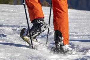 trekker de sapato de neve isolado foto