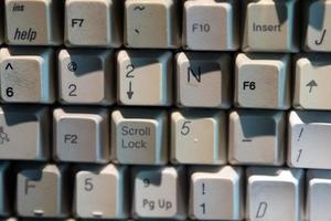 detalhe de botões de teclado de computador antigo foto