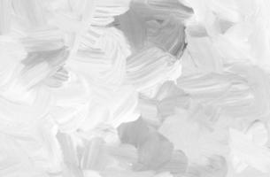 textura de fundo cinza e branco claro, pintado à mão. arte conceitual abstrata. pano de fundo monocromático de óleo. arte minimalista original. modelo para design, convites, cartões. pinceladas no papel. foto