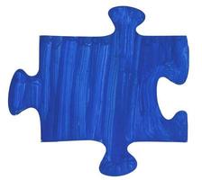 uma peça de quebra-cabeça pintada de azul escuro foto