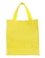 sacola de compras de lona amarela isolada no fundo branco com traçado de recorte foto