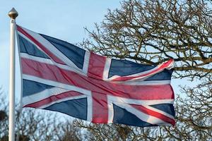 bandeira do reino unido de union jack acenando foto