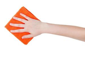 vista superior da mão com pano laranja isolado foto