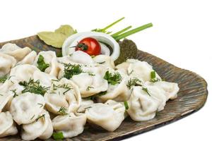 tigela com prato tradicional russo - pelmeni foto