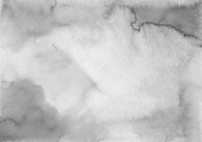 aquarela calma fundo cinza com espaço para texto, pintados à mão. cenário artístico preto e branco, manchas no papel. papel de parede de pintura monocromática aquarelle. foto