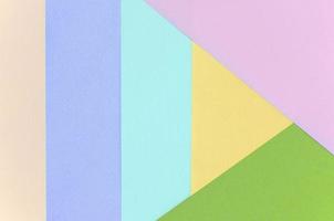 fundo de textura de cores pastel da moda. papéis de padrão geométrico rosa, violeta, amarelo, verde, bege e azul foto