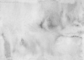 textura de fundo cinza claro em aquarela. manchas brancas e pretas no papel. foto
