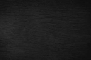 textura de fundo preto de madeira, vista superior da mesa de madeira escura em branco para design foto