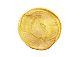 círculo pintado de ouro sobre fundo branco foto