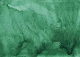 textura de fundo verde mar escuro em aquarela. pano de fundo esmeralda abstrato aquarelle. modelo horizontal. foto