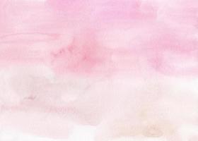 pintura de fundo rosa suave pastel aquarela. pano de fundo líquido aquarela rosa claro rosa. manchas no papel. foto