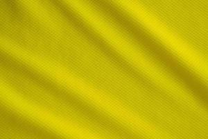 cor amarela roupas esportivas tecido jersey camisa de futebol textura vista de cima close-up foto