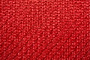 tecido de roupas esportivas vermelho camisa de futebol textura close-up foto