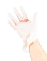 luva médica de cirurgião de látex branco quebrado na mão caucasiana isolada no fundo branco foto
