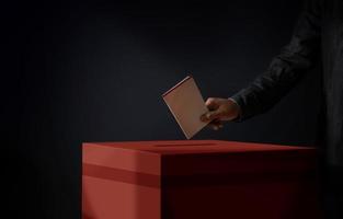 conceito de eleição. pessoa soltando um cartão de voto na caixa de votação, tom cinematográfico escuro foto