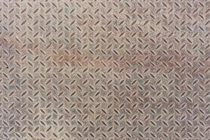 textura de piso de folha de metal pesado plana cinza empoeirada com padrão de prova de derrapagem de diamante ou verificador ou piso. fundo e textura. foto