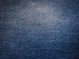 fundo de textura de jeans azul clássico com espaço de cópia para design ou texto foto