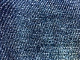 fundo de textura de jeans azul clássico com espaço de cópia para design ou texto foto