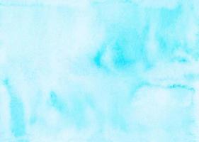 aquarela luz azul textura de fundo pintados à mão. manchas brilhantes de aquarela no papel. foto