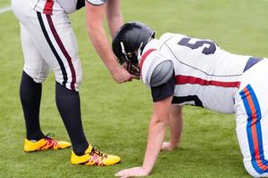 treinamento profissional de jogadores de futebol americano foto