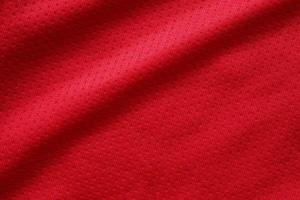 vermelho roupas esportivas tecido camisa de futebol jersey textura fechar foto